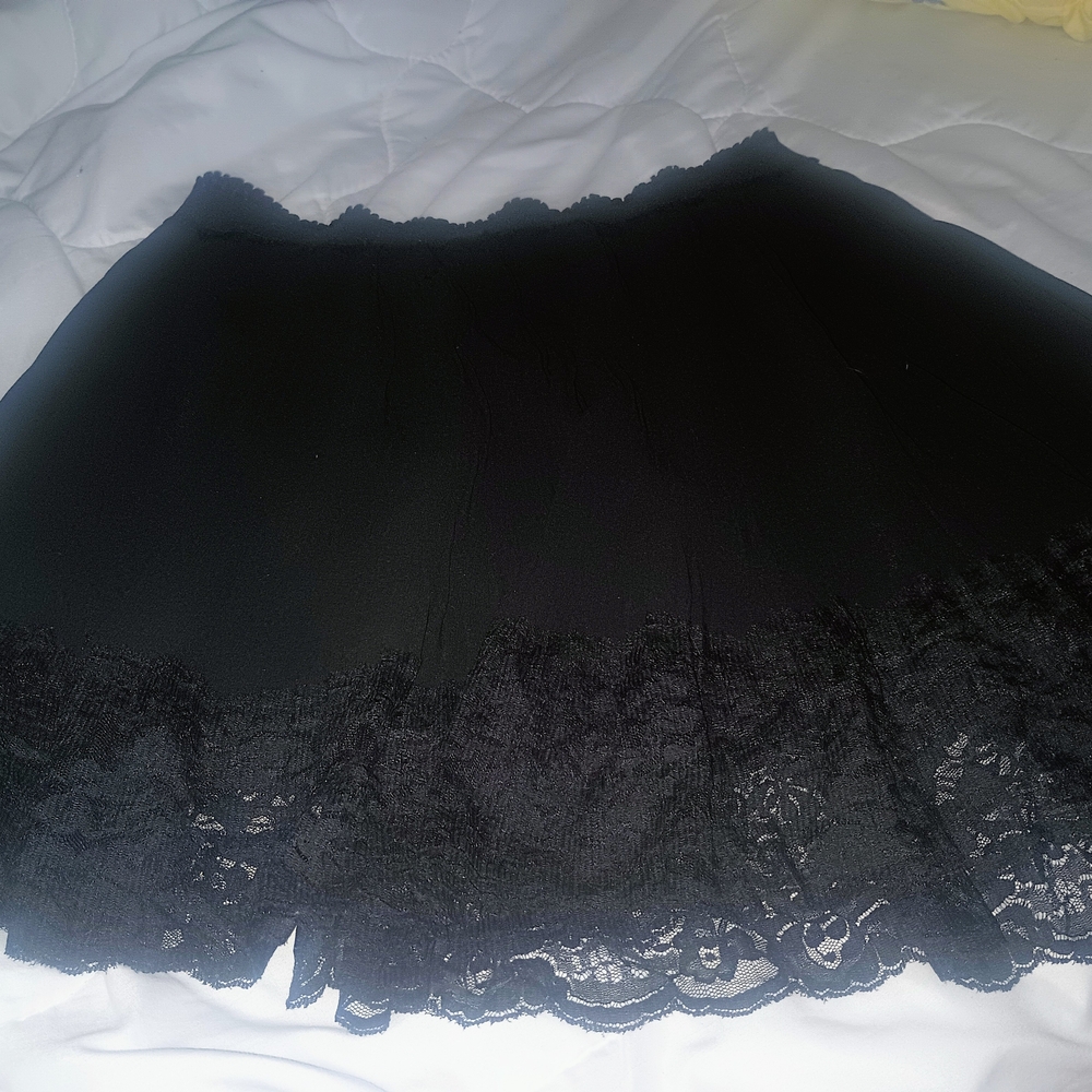 2/$10.   Elegant Black Lace Mini Skirt